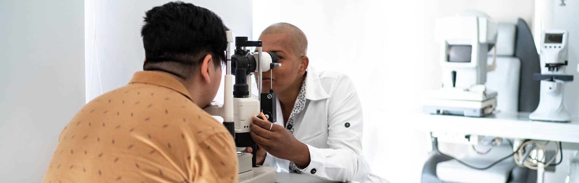 Doctor examining a patients eyes
