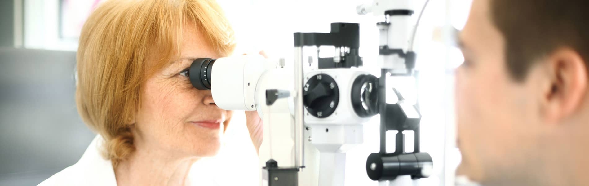 Doctor examining a patients eyes